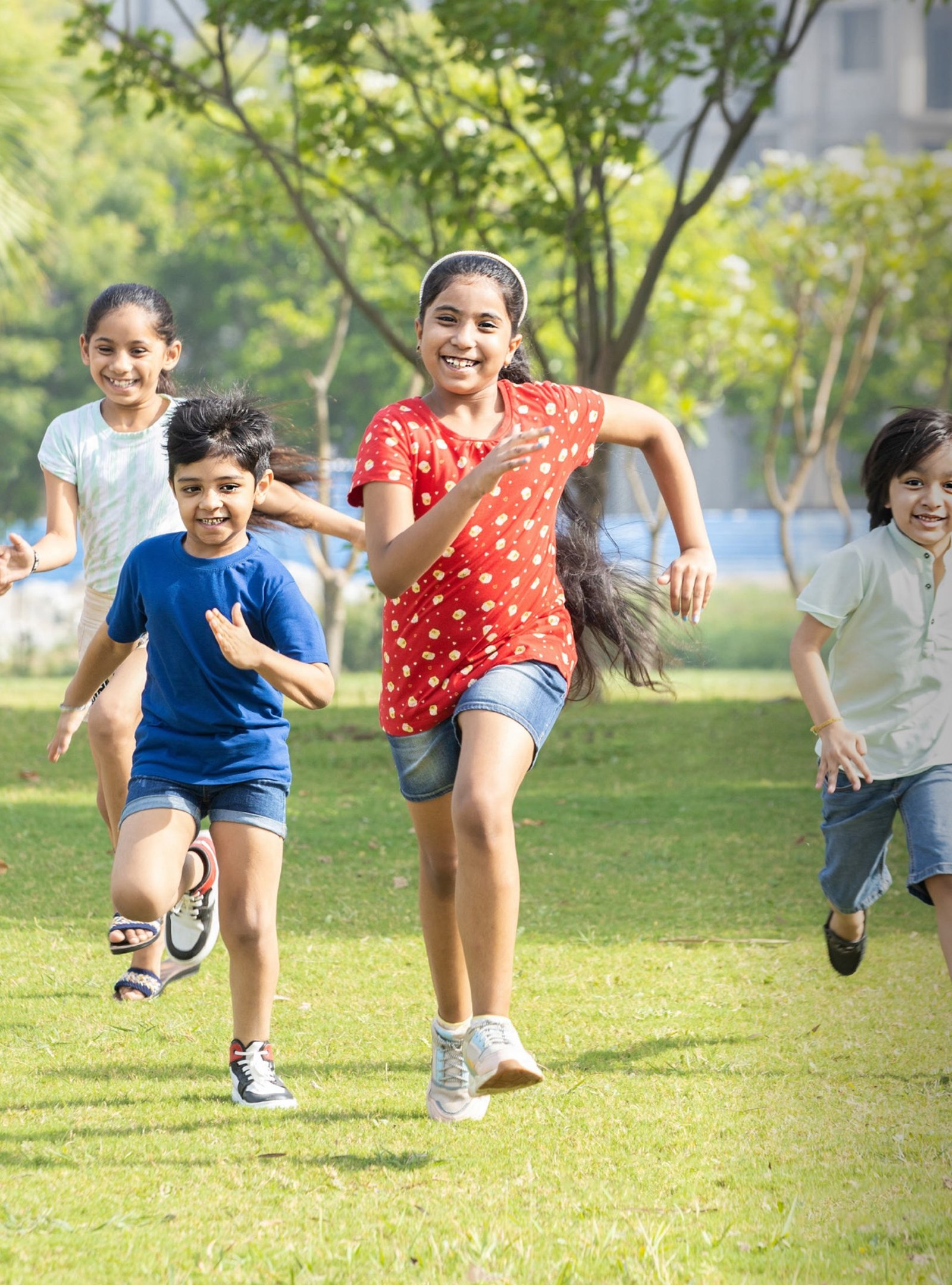Children running in a park