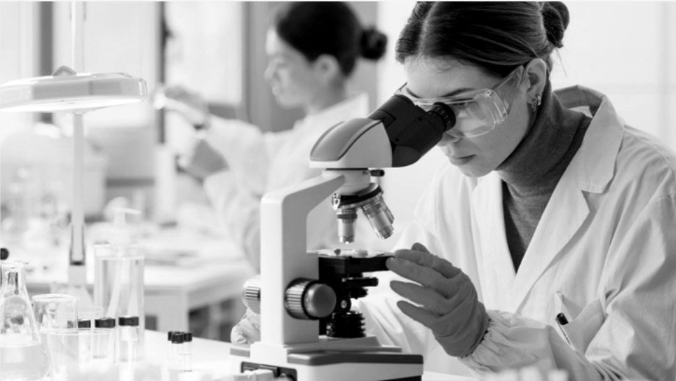 Scientist at a microscope